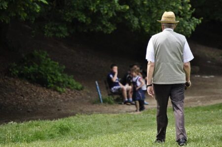 800px old man walking in the park of germiaprishtine